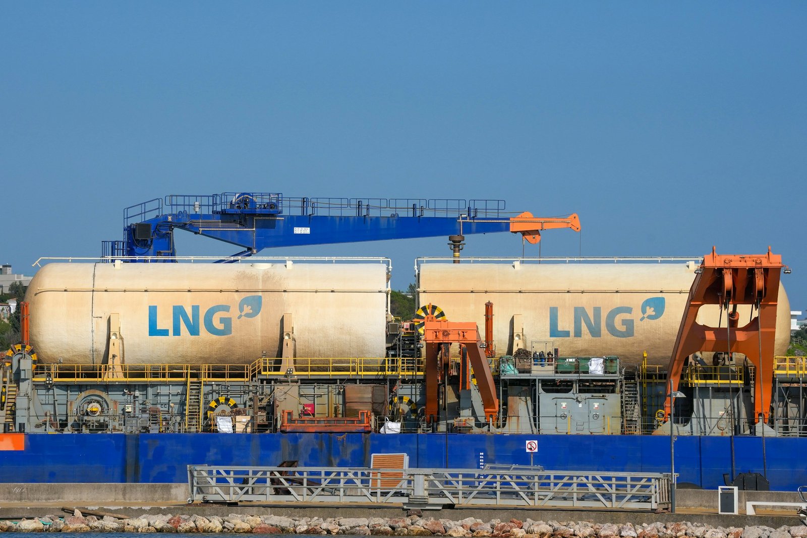 LNG tanks on a barge with cranes