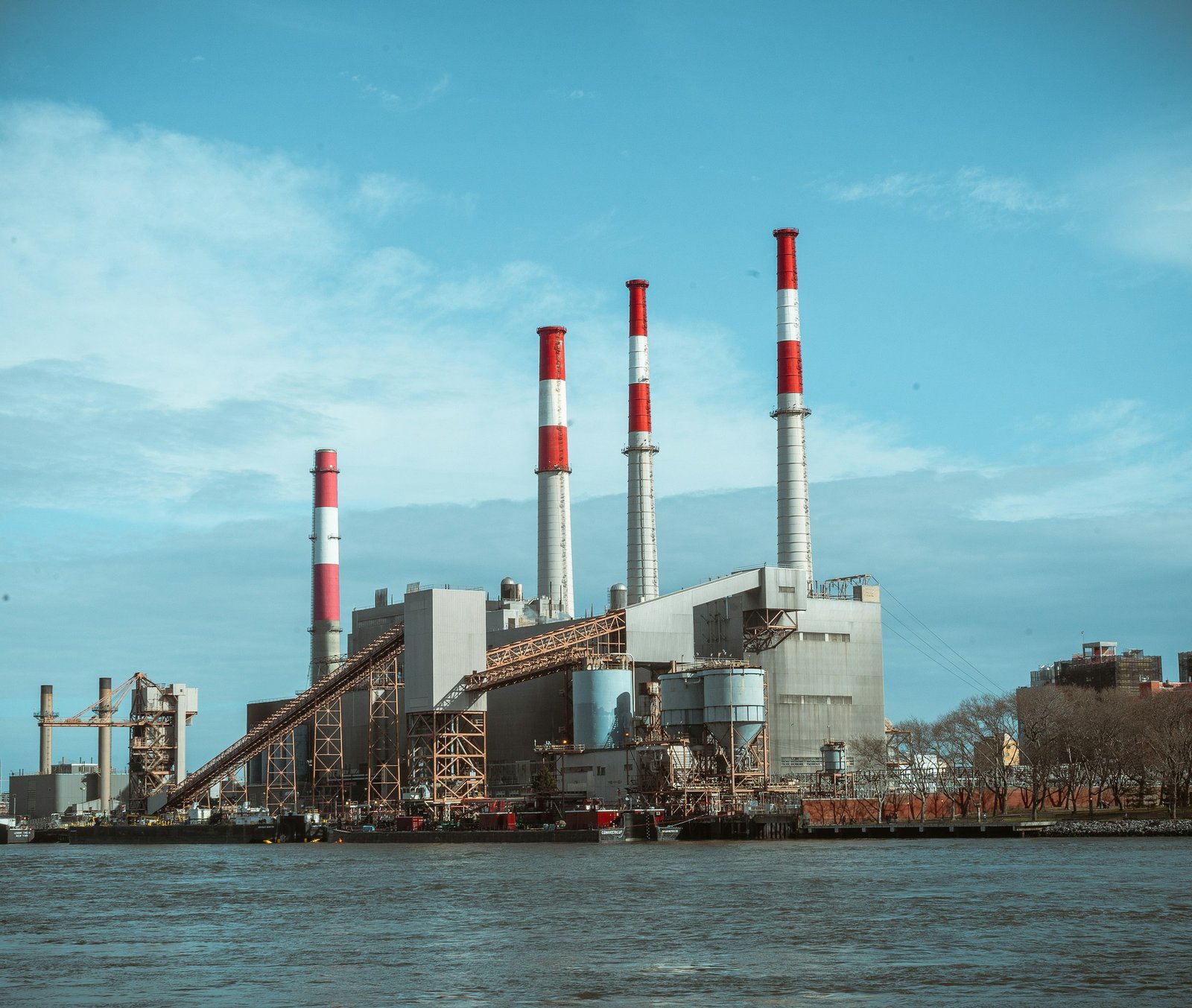 Oil refinery factory building under blue sky